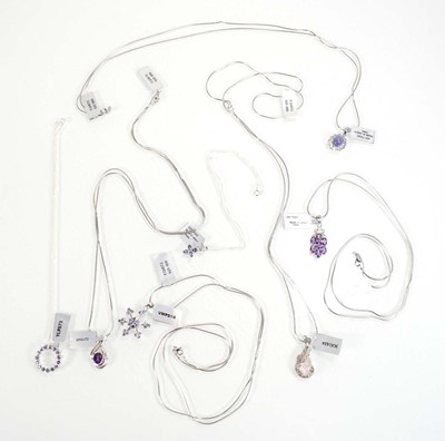 Lot 803 - Seven silver and metalware pendant necklaces...