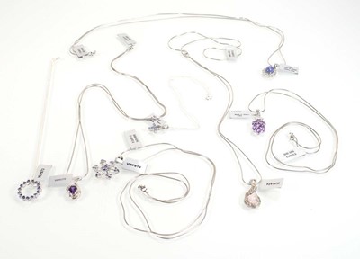 Lot 803 - Seven silver and metalware pendant necklaces...