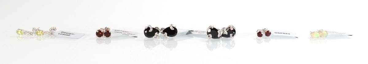Lot 810 - Six pairs of silver ear studs, each set...