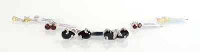 Lot 810 - Six pairs of silver ear studs, each set...