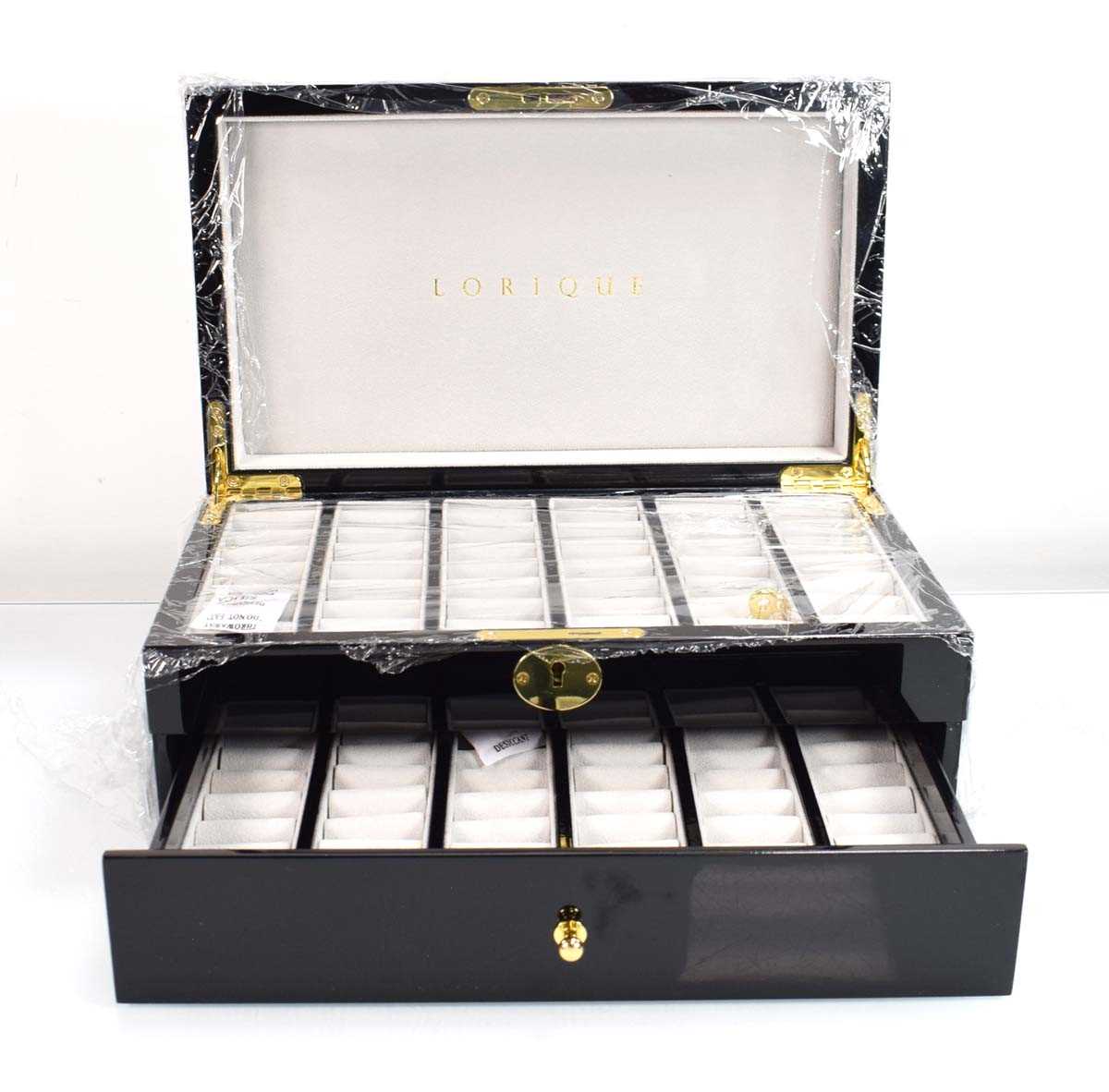 Lot 819 - A Lorlique black lacquer style two section...
