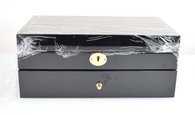 Lot 819 - A Lorlique black lacquer style two section...