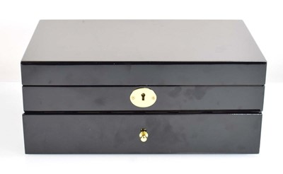 Lot 821 - A Lorlique black lacquer style two section...