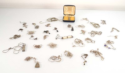 Lot 825 - A collection of silver and metalware pendants,...