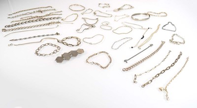 Lot 828 - A collection of silver and metalware bracelets...