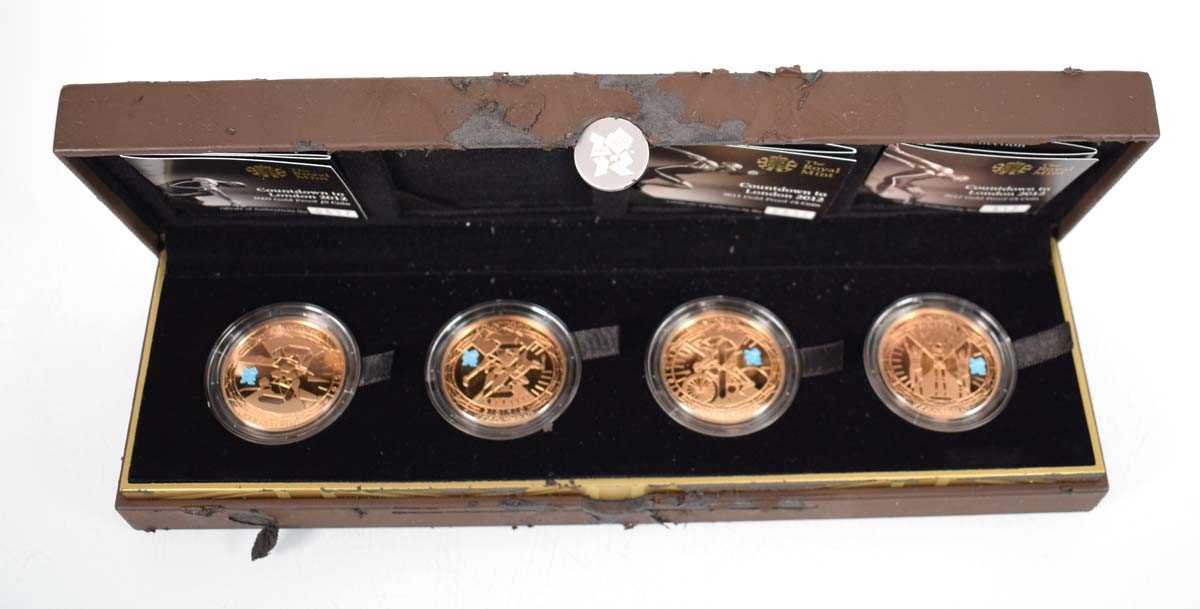 Lot A Royal Mint Countdown to London Olympics gold...