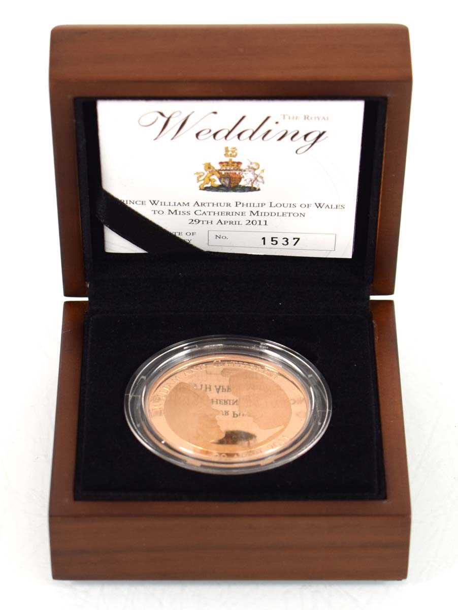 Lot A Royal Mint 2011 gold proof £5 coin...