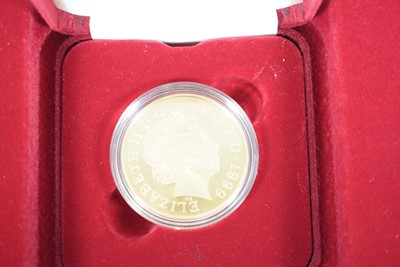 Lot A Royal Mint 1999 gold proof £5 coin...