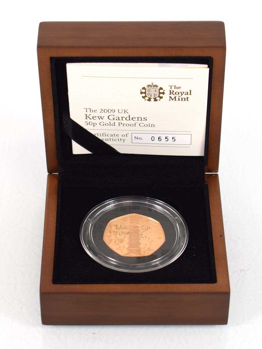 Lot A Royal Mint 2009 gold proof 50p commemorating...