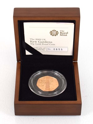 Lot A Royal Mint 2009 gold proof 50p commemorating...