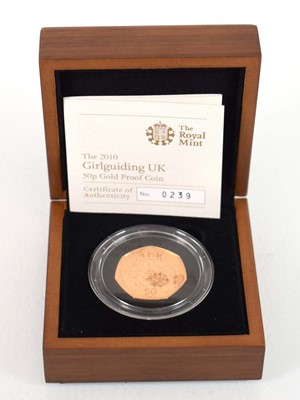 Lot A Royal Mint 2010 gold proof 50p commemorating...