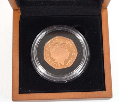 Lot A Royal Mint 2010 gold proof 50p commemorating...