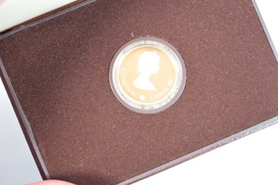Lot A Royal Canadian Mint 1987 $100 coin...