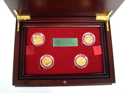 Lot A Fifa Centennial gold four coin set:...