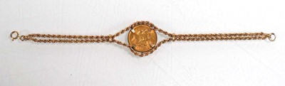 Lot 978 - A 9ct yellow gold ropetwist bracelet set an...