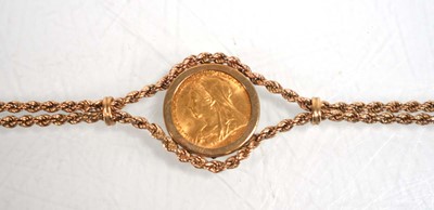 Lot 978 - A 9ct yellow gold ropetwist bracelet set an...