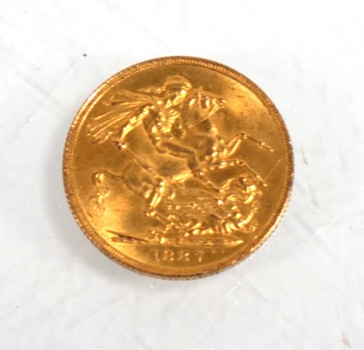 Lot 990 - A Victorian sovereign dated 1887