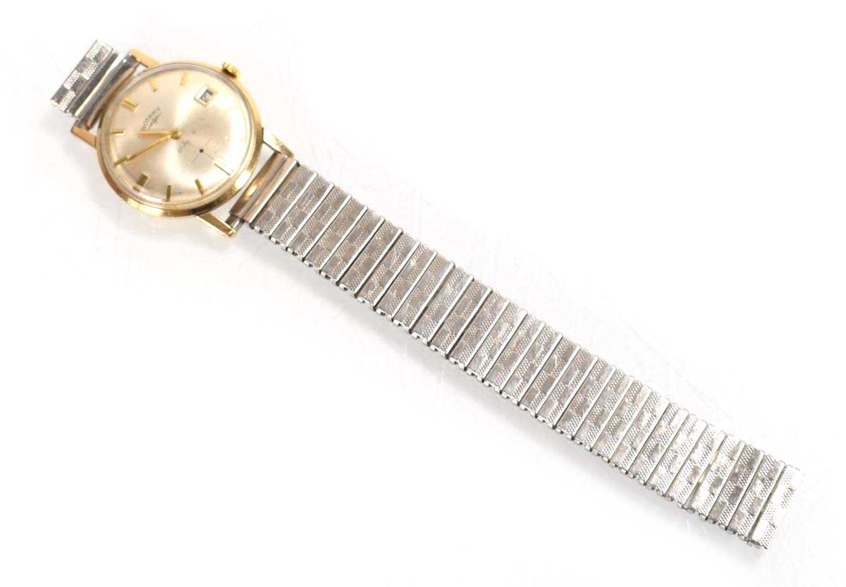 Lot 888 - A gentleman's 9ct yellow gold wristwatch by...