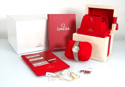 Lot 900 - A ladies stainless steel and gold plated...