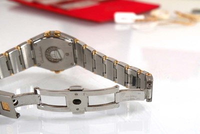 Lot 900 - A ladies stainless steel and gold plated...