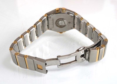 Lot 900 - A ladies stainless steel and gold plated...