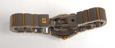 Lot 900 - A ladies stainless steel and gold plated...