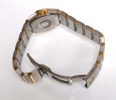 Lot 900 - A ladies stainless steel and gold plated...
