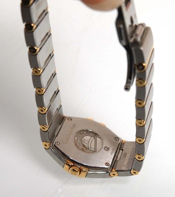 Lot 900 - A ladies stainless steel and gold plated...