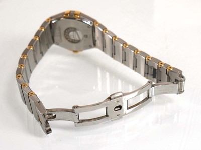 Lot 900 - A ladies stainless steel and gold plated...