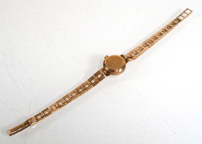 Lot 901 - A ladies 9ct yellow gold wristwatch by...