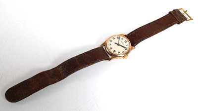 Lot 903 - A ladies 9ct yellow gold wristwatch by Rolex,...