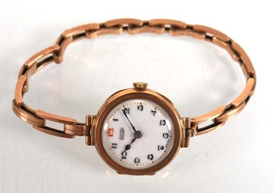 Lot 904 - A ladies 9ct yellow gold wristwatch by Imshi,...