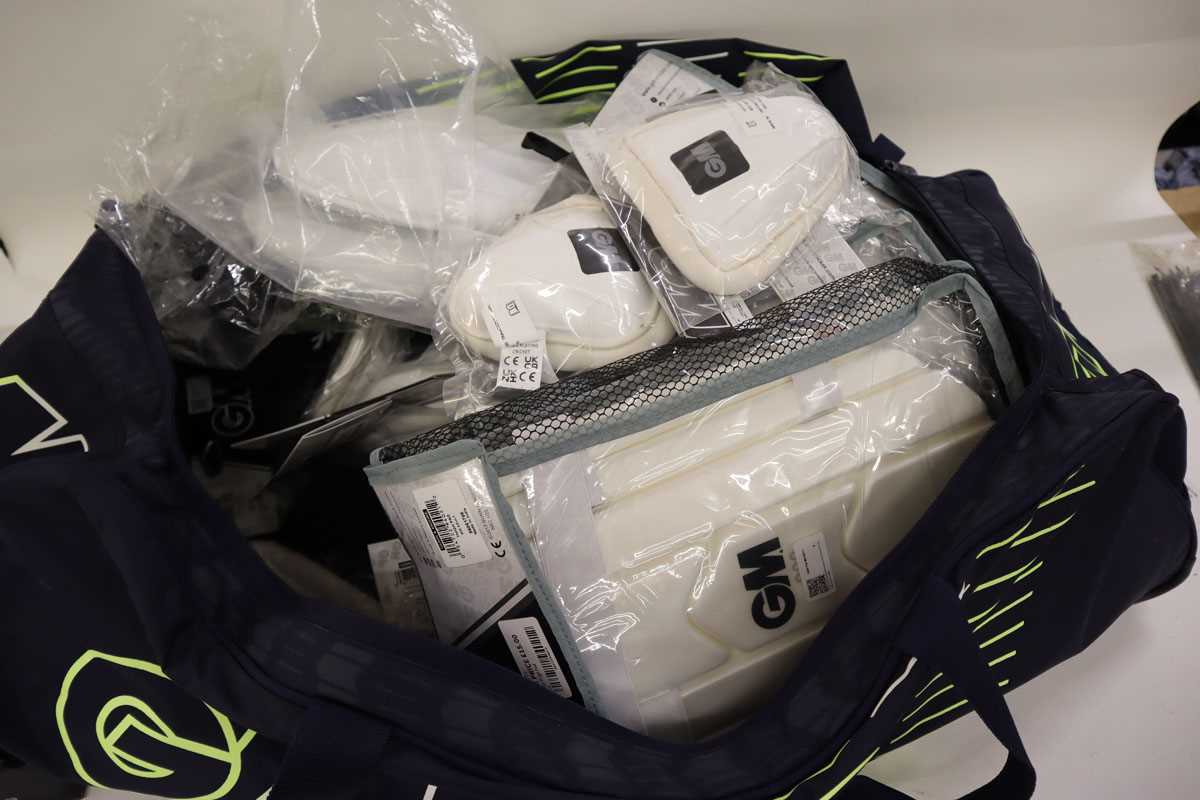 Lot GM cricket bag containing a large number...