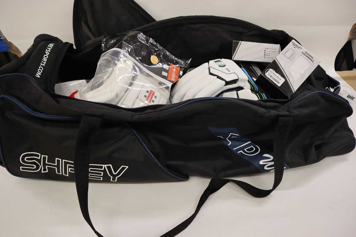 Lot Shrey cricket bag containing cricket batting...