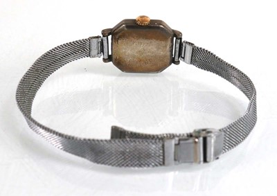 Lot 907 - A ladies silver wristwatch by Longines, the...