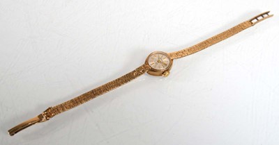 Lot 909 - A ladies 9ct yellow gold wristwatch by Gatward,...