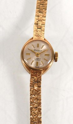 Lot 909 - A ladies 9ct yellow gold wristwatch by Gatward,...