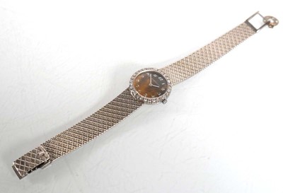 Lot 910 - A ladies 18ct white gold cocktail wristwatch...