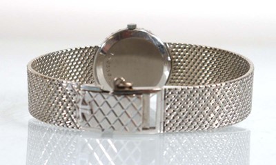 Lot 910 - A ladies 18ct white gold cocktail wristwatch...
