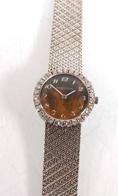 Lot 910 - A ladies 18ct white gold cocktail wristwatch...