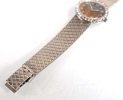 Lot 910 - A ladies 18ct white gold cocktail wristwatch...