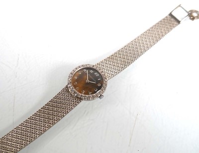 Lot 910 - A ladies 18ct white gold cocktail wristwatch...