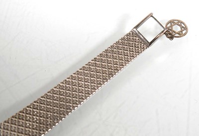 Lot 910 - A ladies 18ct white gold cocktail wristwatch...
