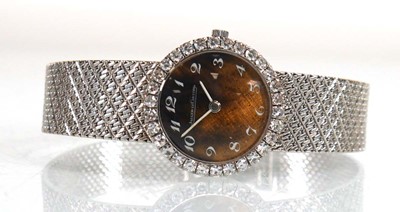 Lot 910 - A ladies 18ct white gold cocktail wristwatch...