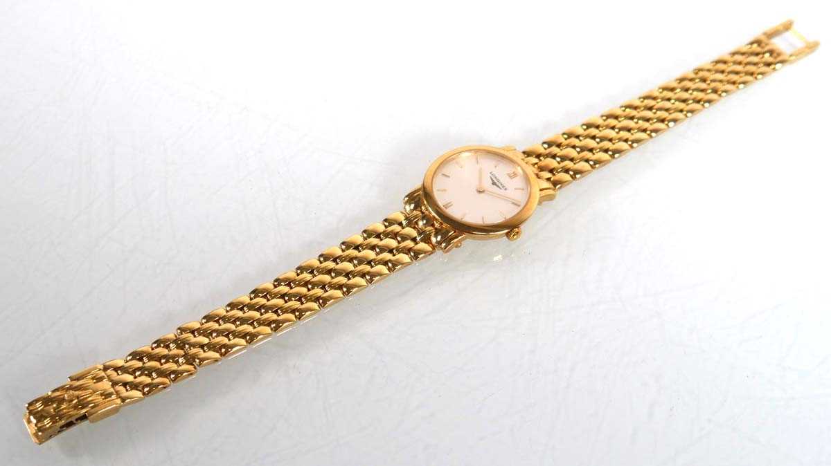 Lot 911 - A ladies 18ct yellow gold wristwatch by...