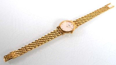 Lot 911 - A ladies 18ct yellow gold wristwatch by...