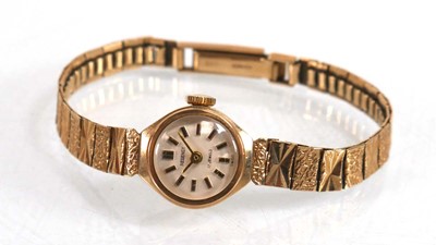 Lot 912 - A ladies 9ct yellow gold wristwatch by Regency,...
