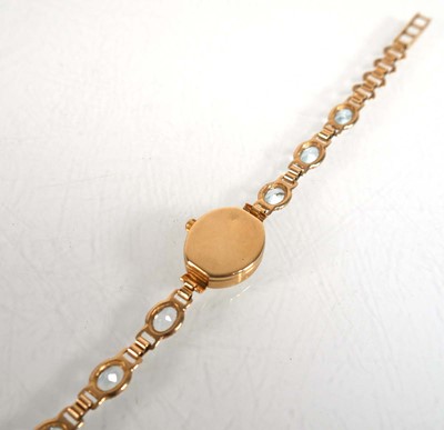 Lot 913 - A ladies 9ct yellow gold wristwatch by...