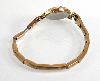 Lot 914 - A ladies gold plated wristwatch by Gruen, the...