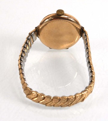 Lot 915 - A ladies 9ct yellow gold wristwatch, the...